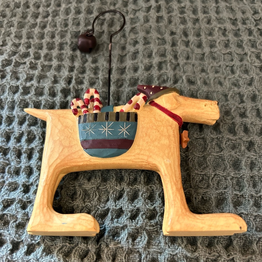 Festive Resin Dog Ornament with Candy Canes.